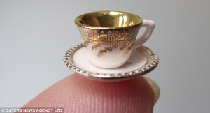 The world's smallest bone china tea set is an exact replica of a 1795 set. It costs £137 for eight pieces of crockery gilded in 22 carat gold and was created for the Queen of England's Diamond Jubilee 